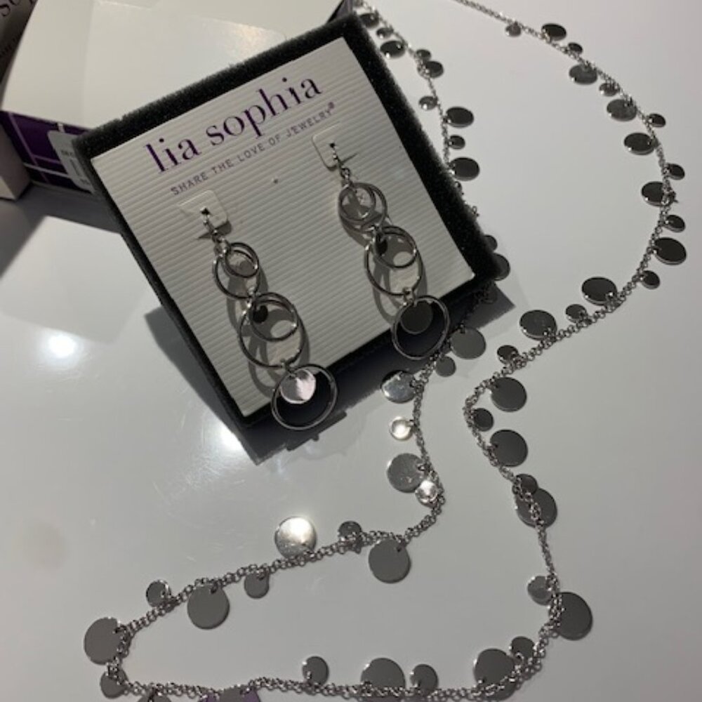 New silver Reflection earrings and necklace